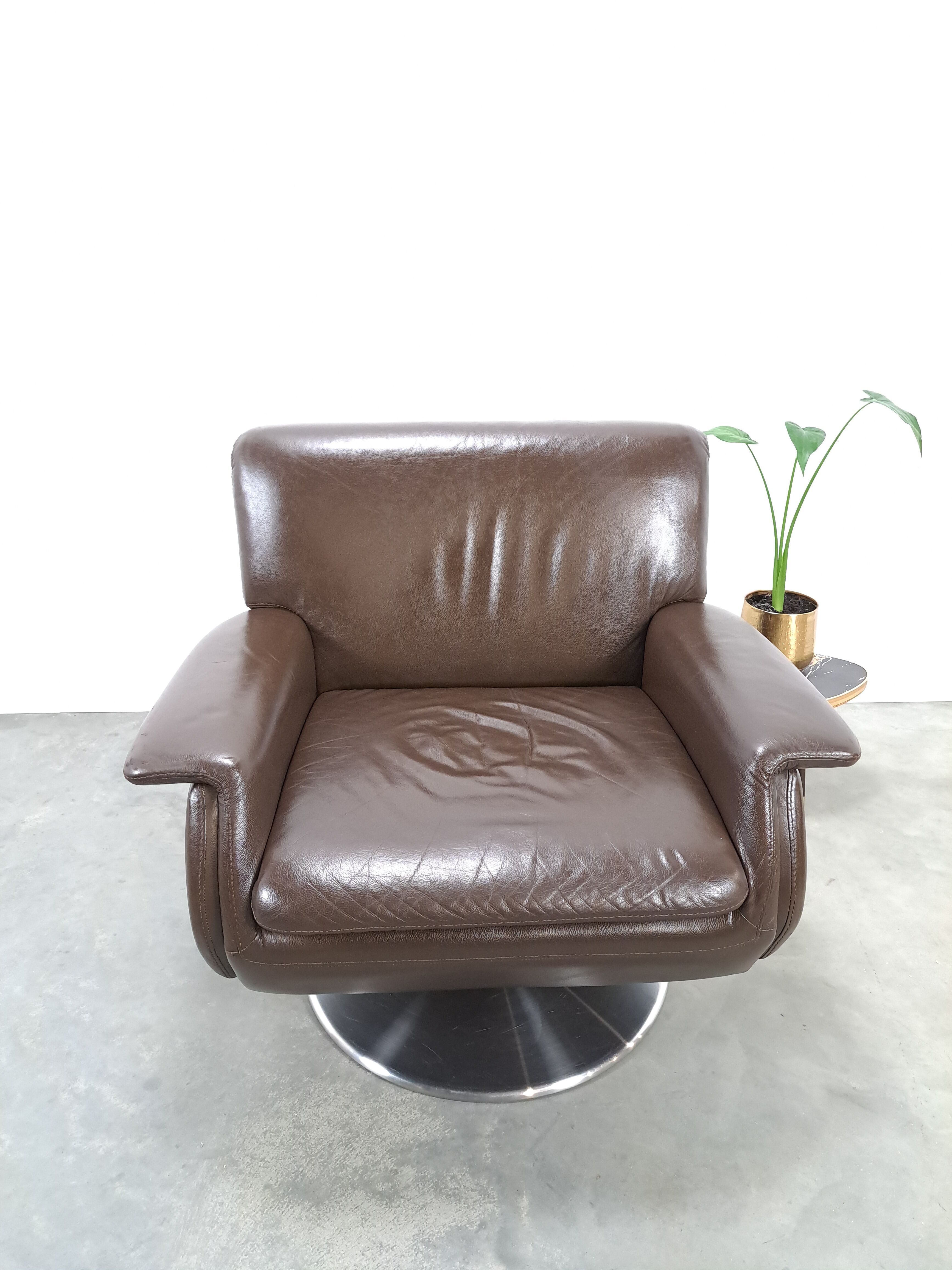 Brown leather swivel chair