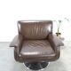 Brown leather swivel chair