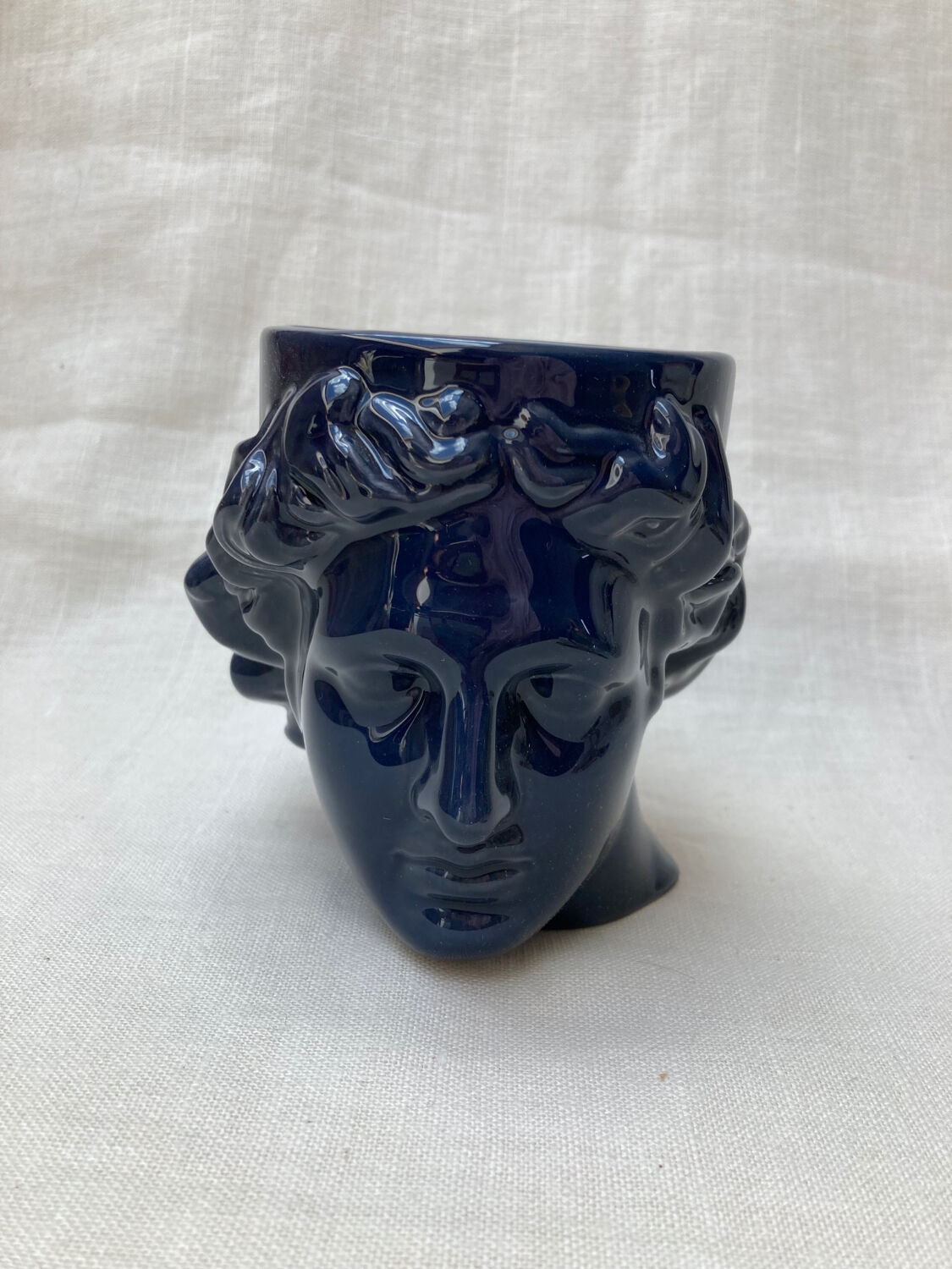 Roman head cup