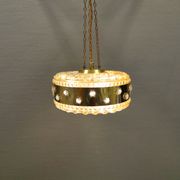 Ceiling-hanging lamp in glass with prisms and metal details