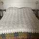 White cotton crochet bedspread with squares