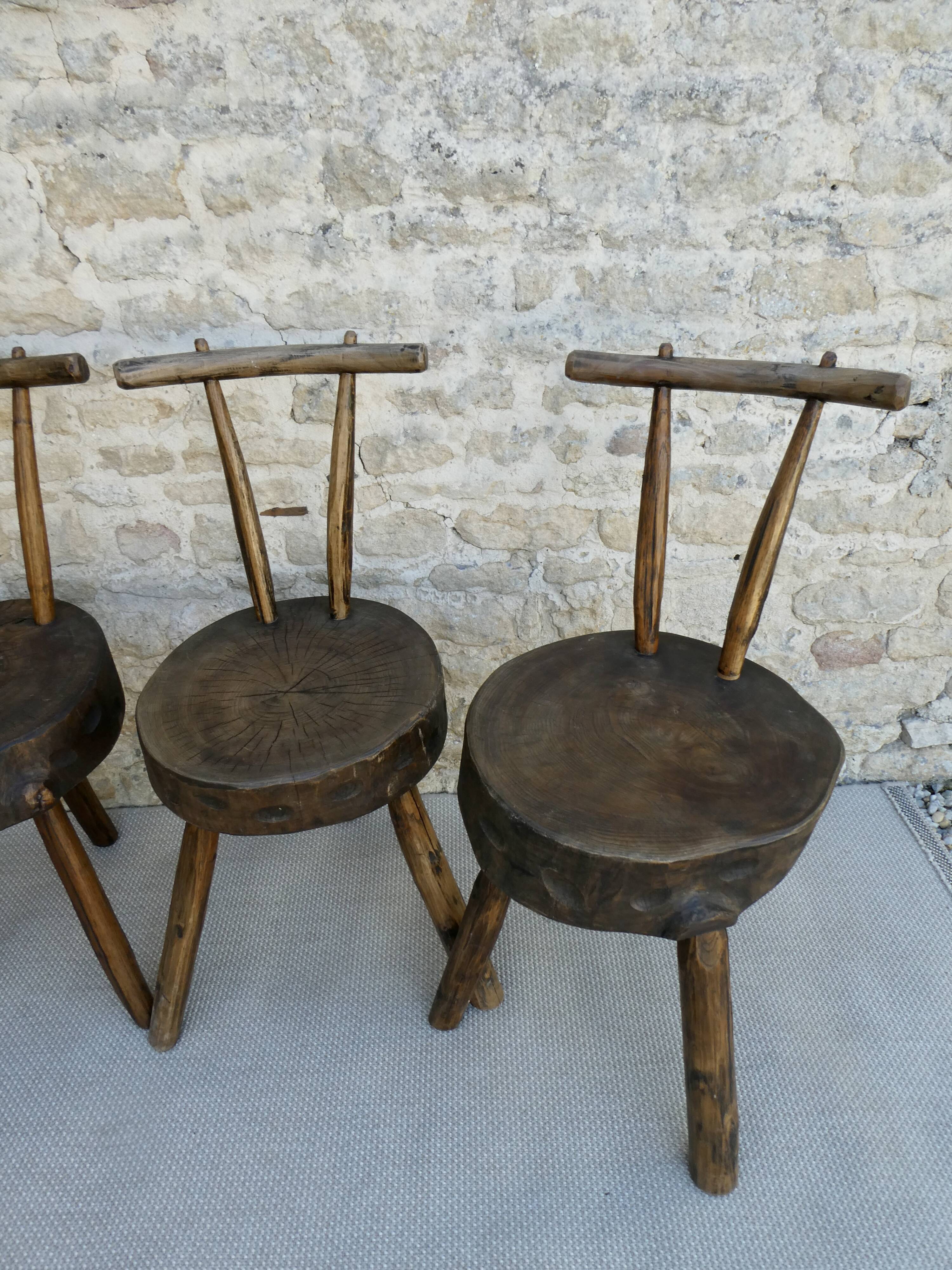 Suite of 4 tripod chairs, trunk seats, solid wood
