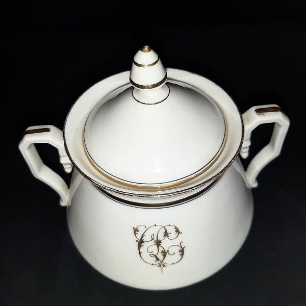 Porcelain sweetener and milk jug with cipher