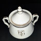 Porcelain sweetener and milk jug with cipher