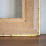 Frame in gilded and green wood