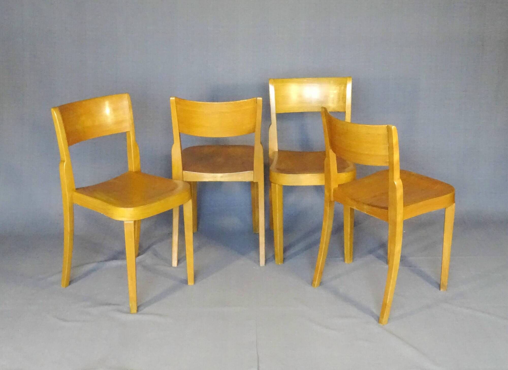 4 bistro chairs, around 1960, by Horgen Glarus - Switzerland - golden oak finish.