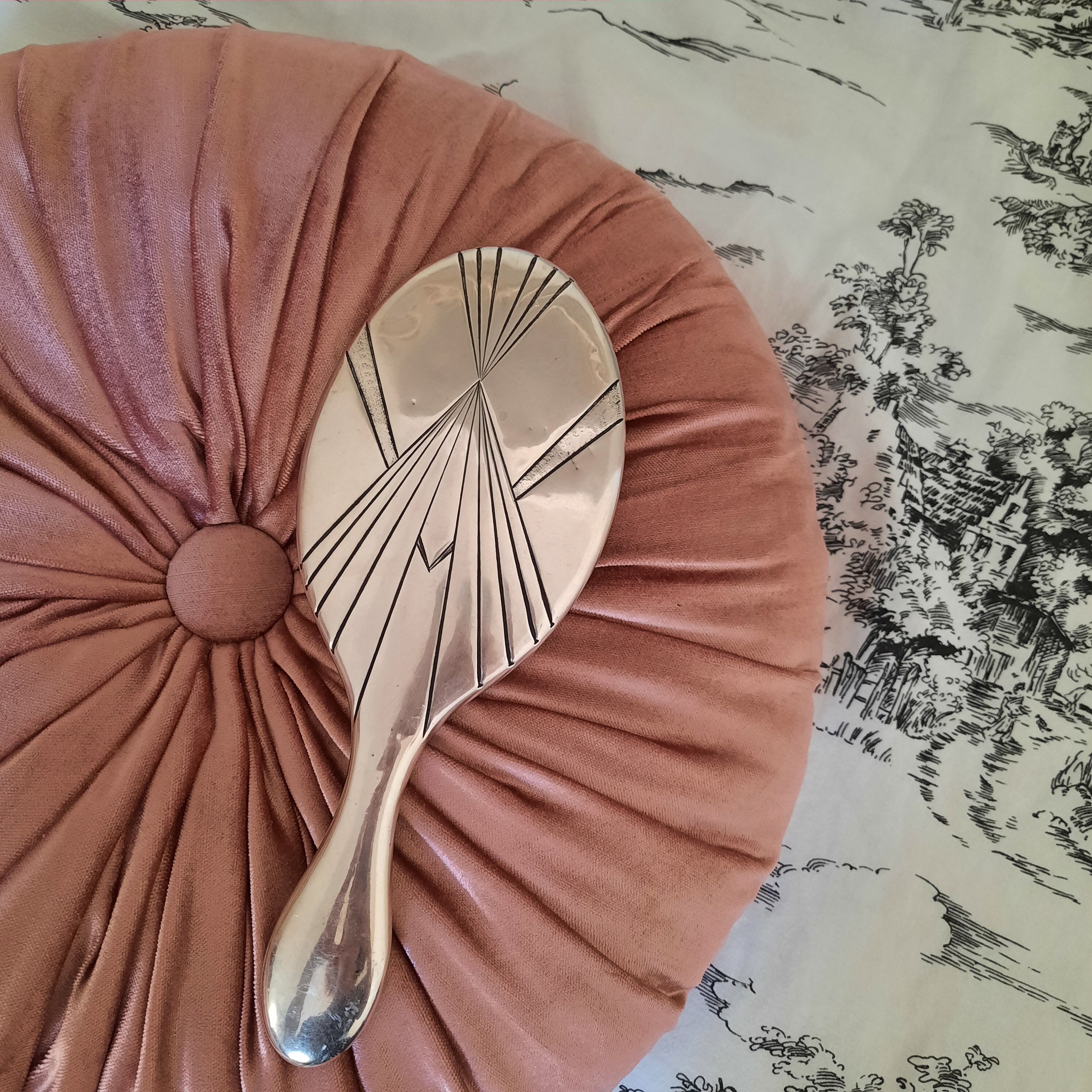 Art Deco hand-facing in silver metal and beveled mirror, circa 1930