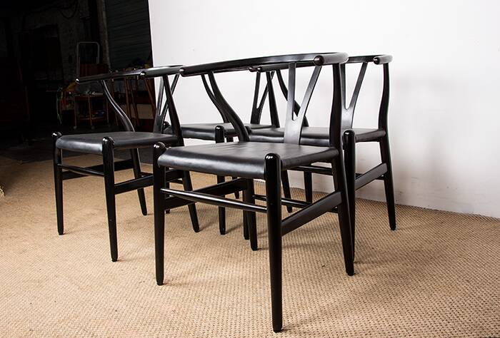 4 Danish chairs, black lacquered wood and leather, Wishbone model, Hans Wegner