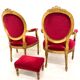 Pair of Louis XVI-style armchairs and one ottoman