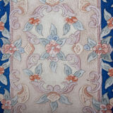 Chinese fringe rug with floral pattern on blue and beige background 63x143cm