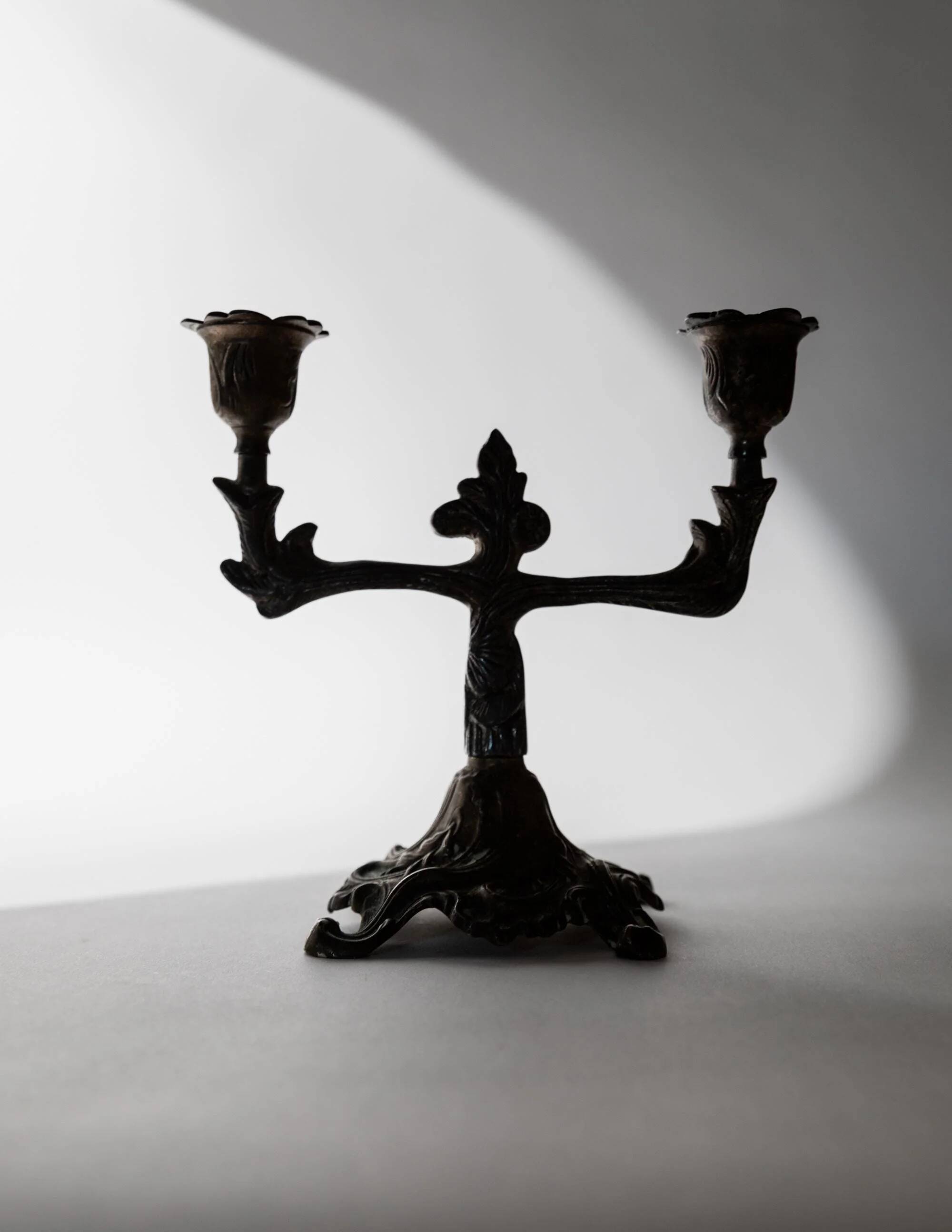 Vintage bronze candlestick for two candles, 1910s, Art Deco design.