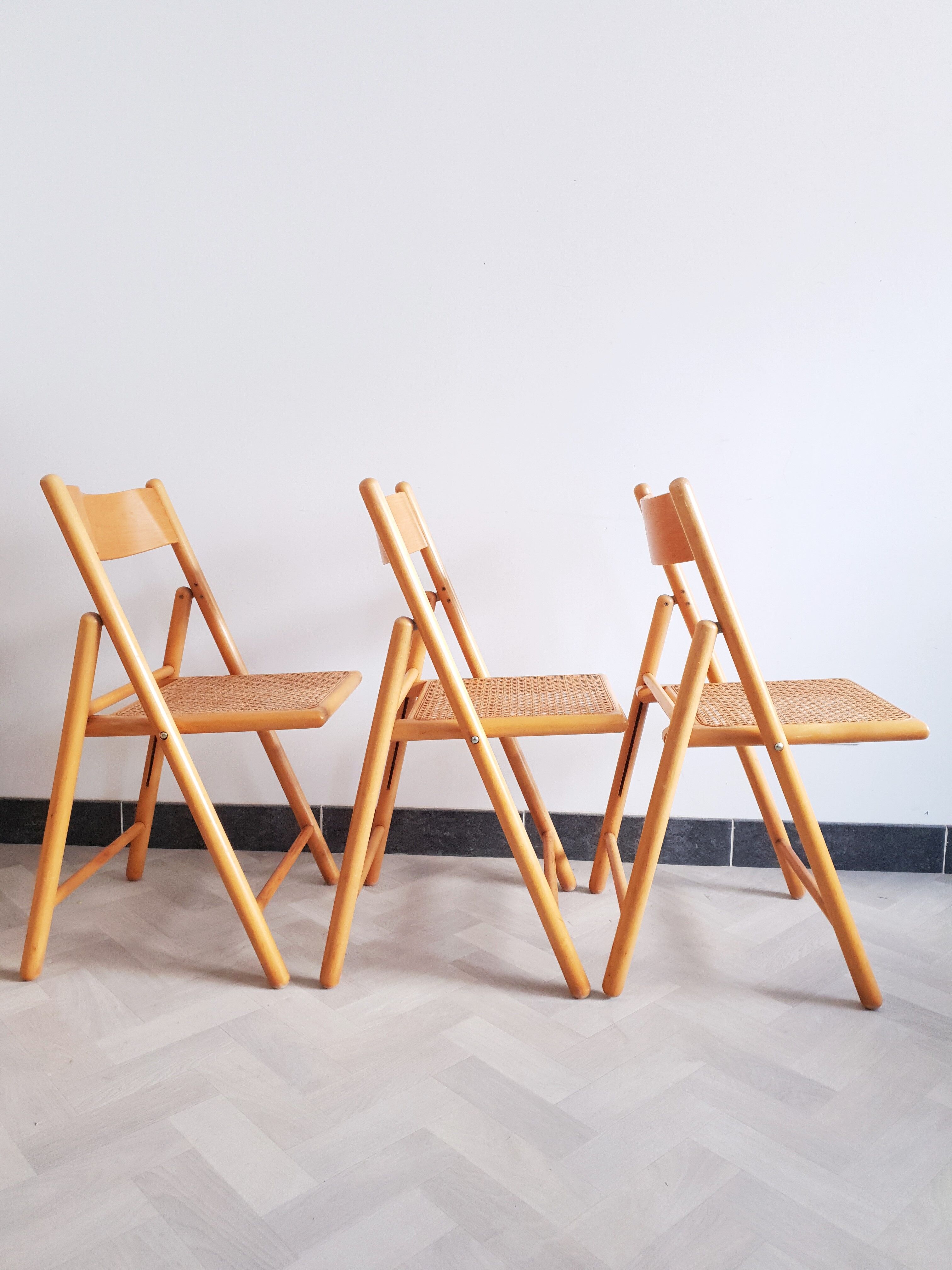Trio of cannate chairs