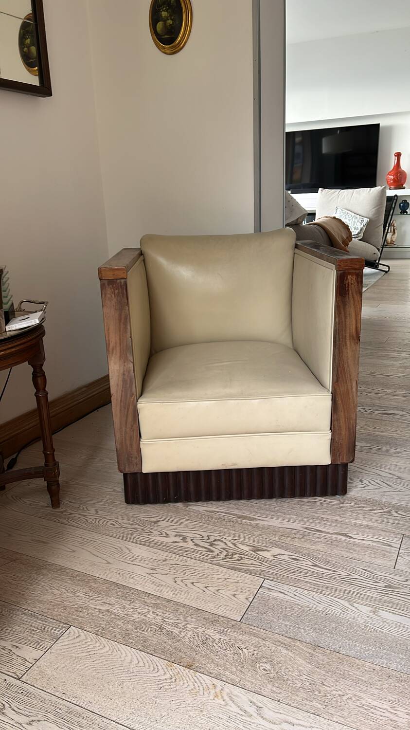 Two armchairs and an Art Deco style pouf