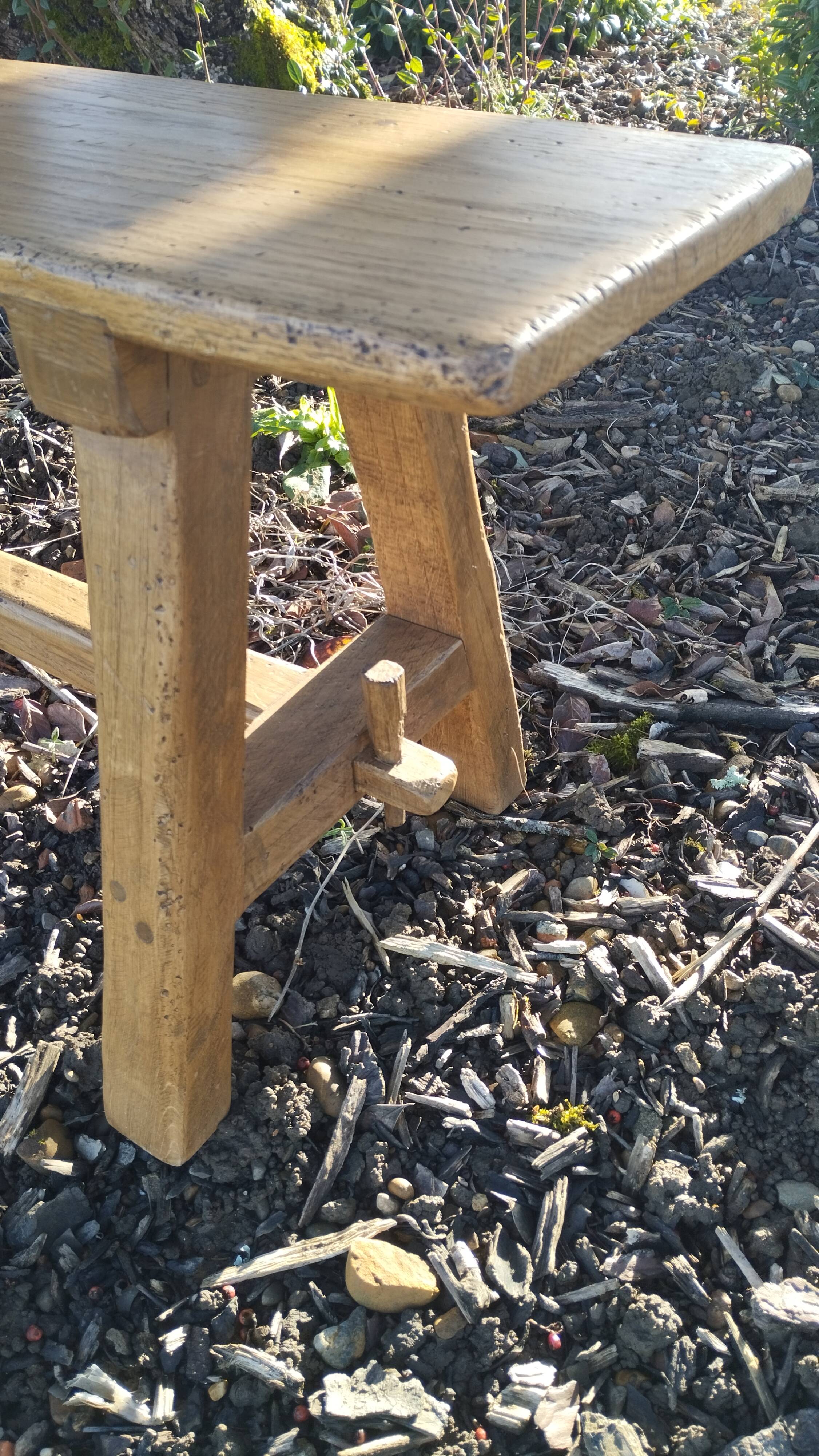 "A frame" bench in solid oak, patinated.