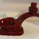 Ruby red ceramic pocket ashtray from Vallauris, numbered.
