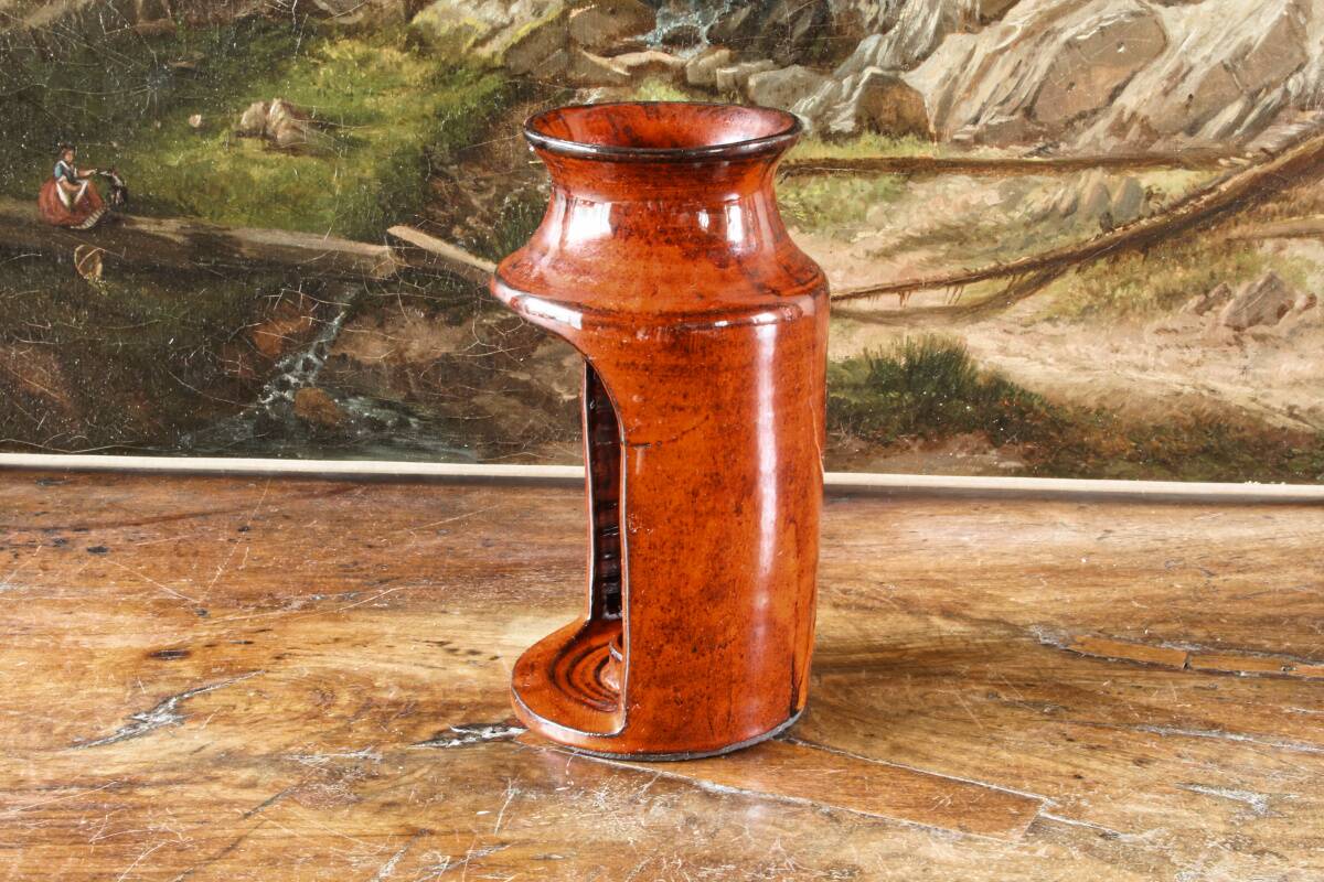 Signed orange ceramic candle holder and jug