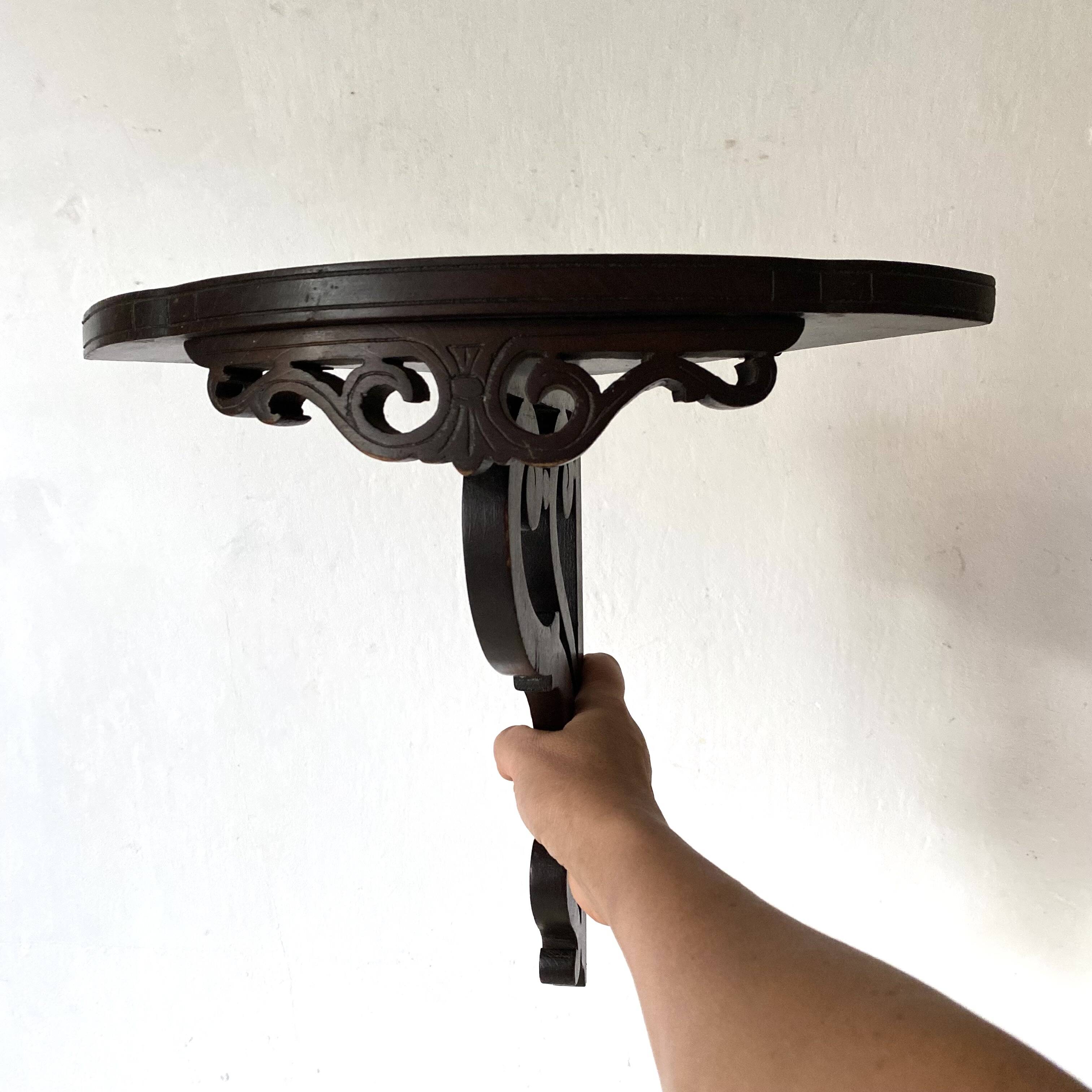 openwork dark wood wall corner shelf