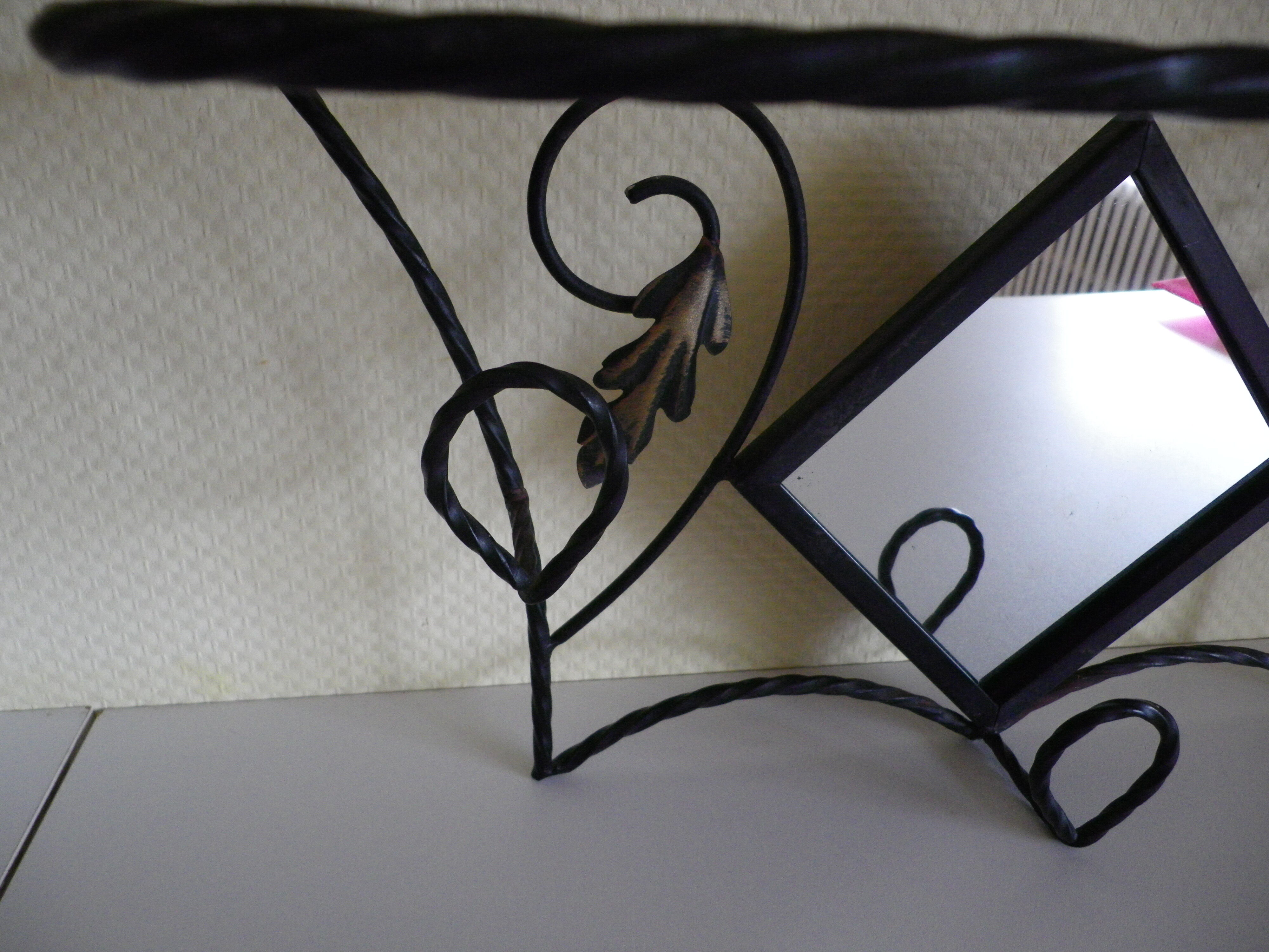 Wrought iron wall holder with top support and built-in mirror