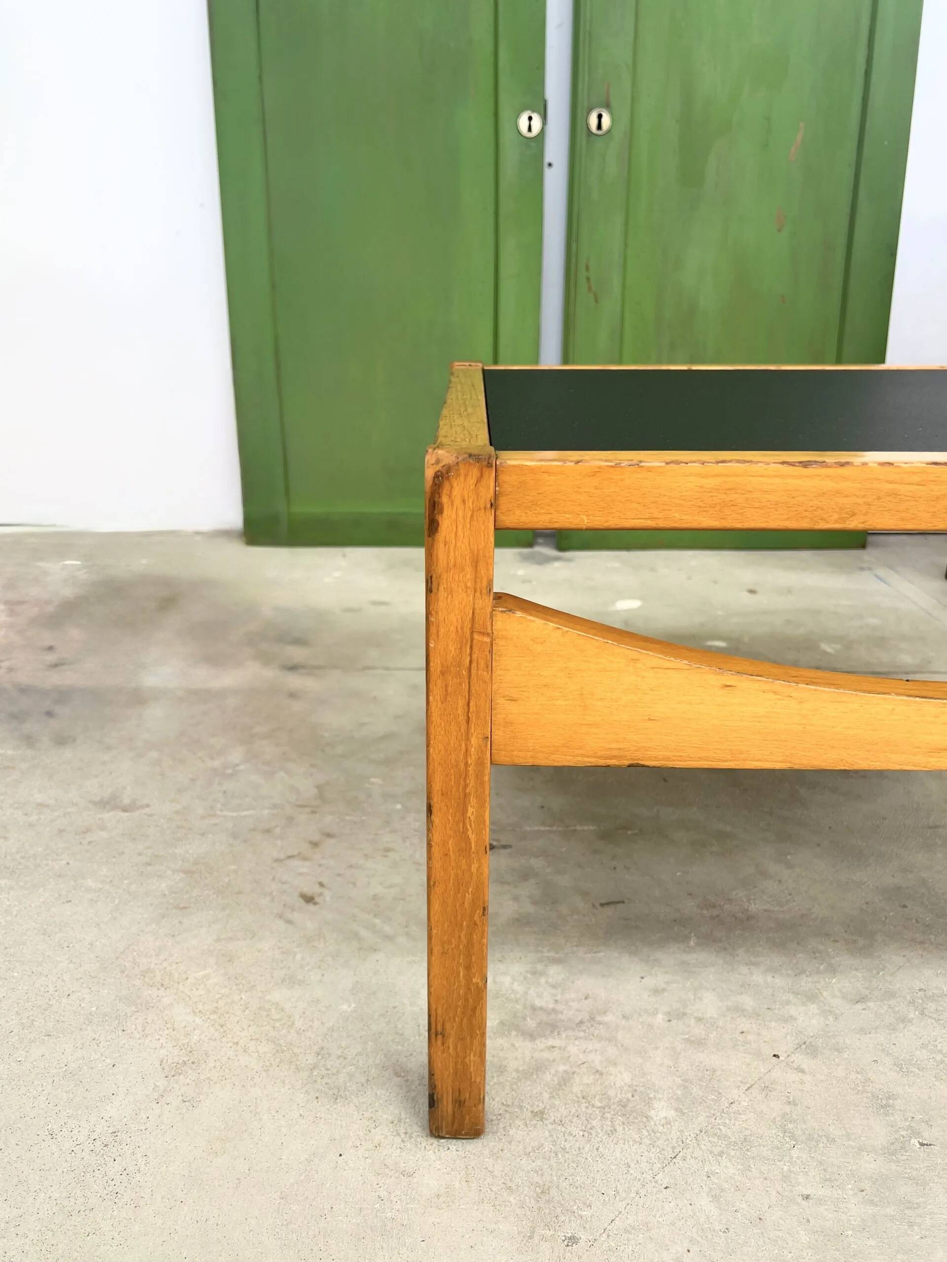 Baumann coffee table with black medium-density top