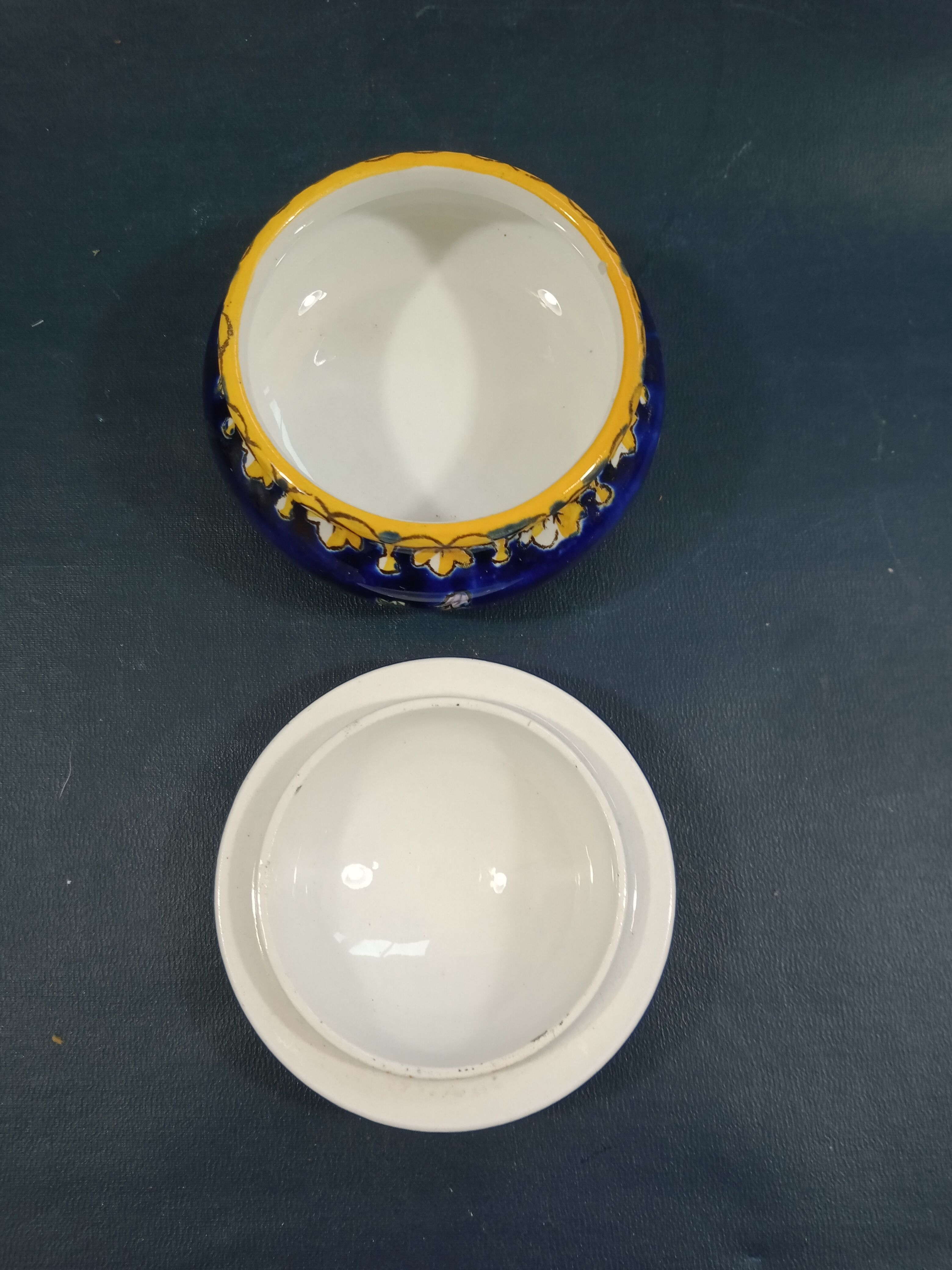 Empty Gien earthenware pocket decorated with chimera decoration