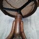 Office chair with curved wood swivel screw and Thonet cannage