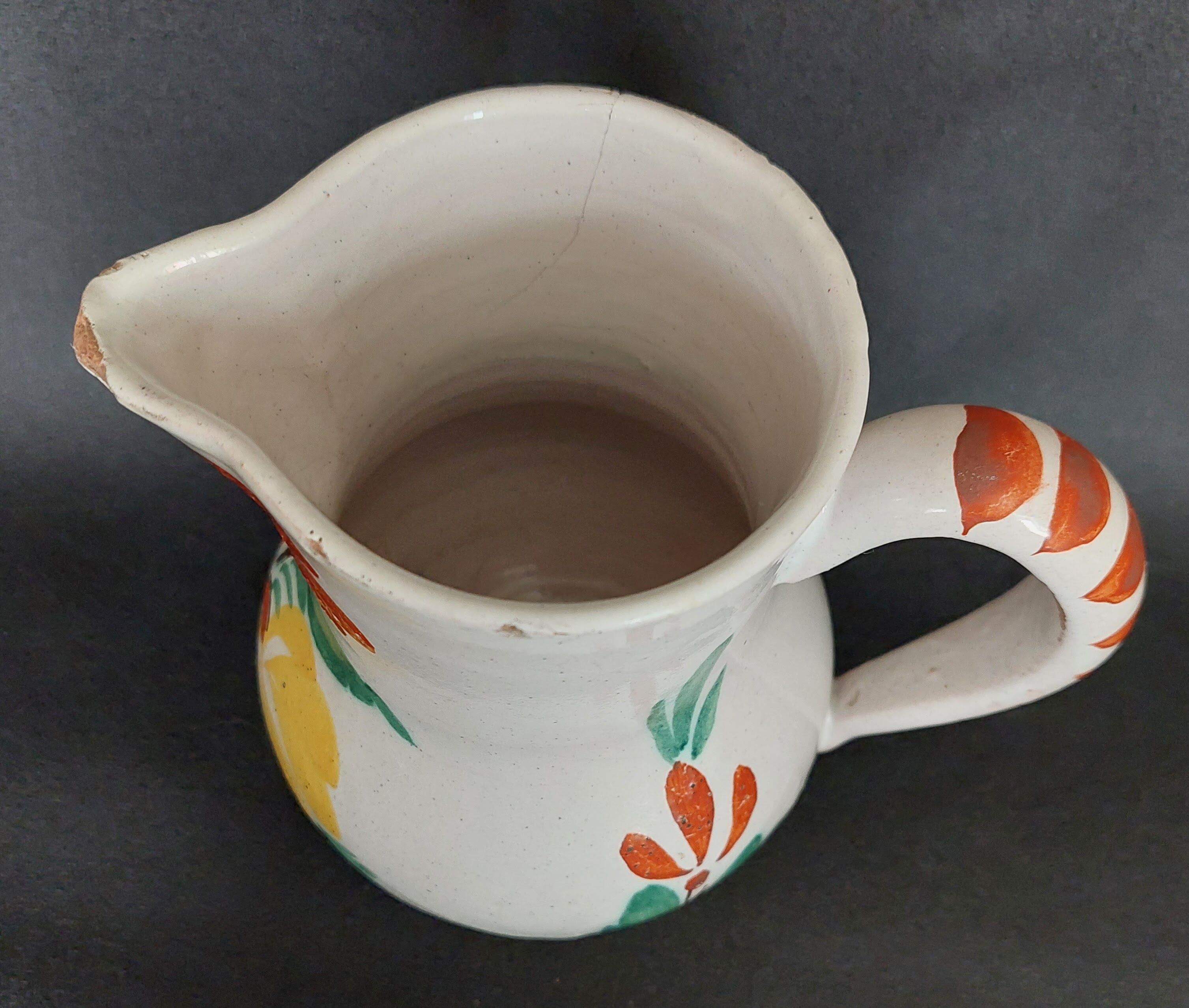Earthenware pitcher from the late 19th century.