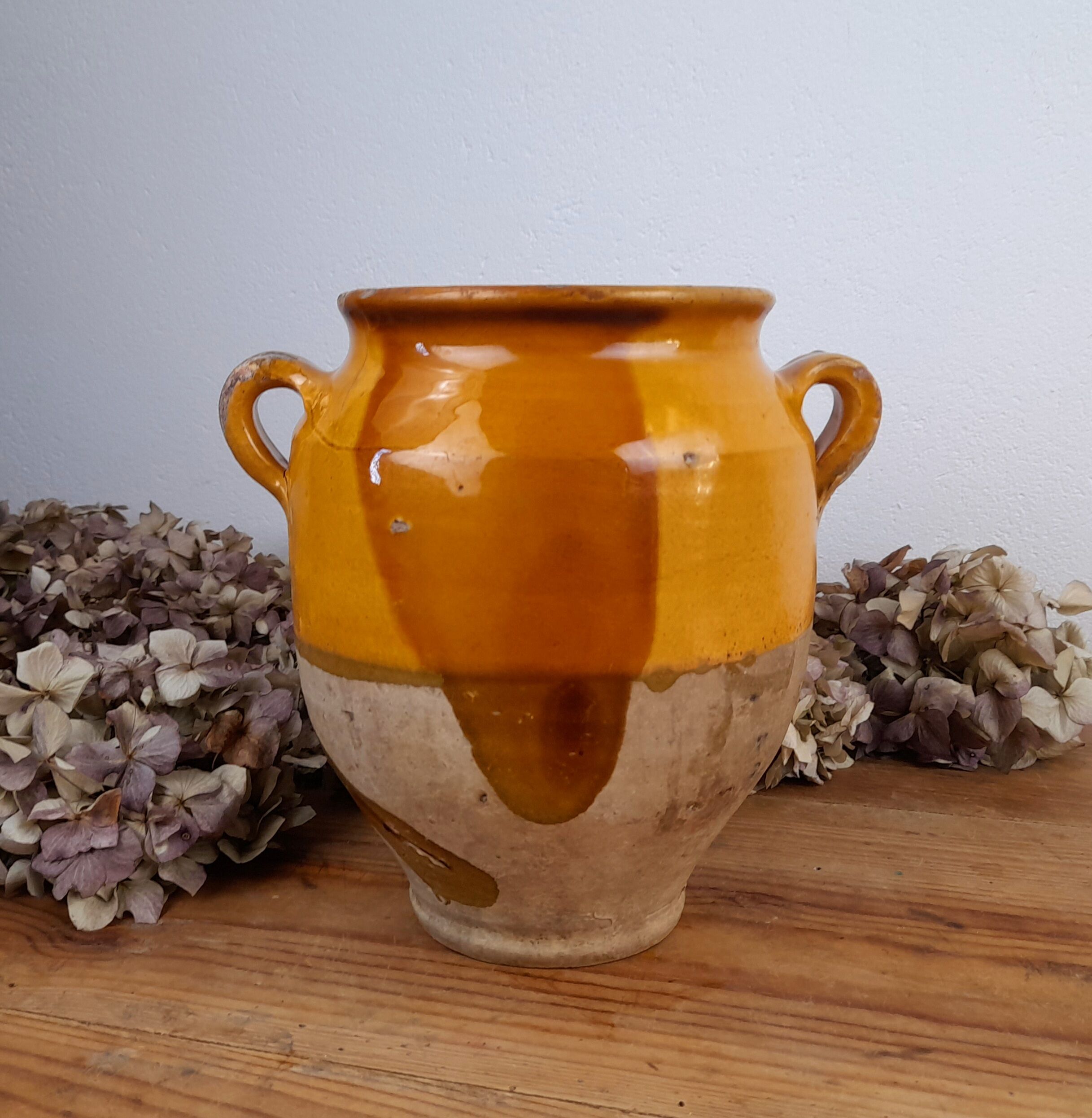 Old glazed terracotta grease pot