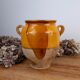 Old glazed terracotta grease pot