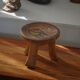 Small tripod stool Kamba hand-carved, elephant motif, Kenya, mid-20th century.