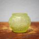 Fluorescent yellow ball vase with vine leaf patterns