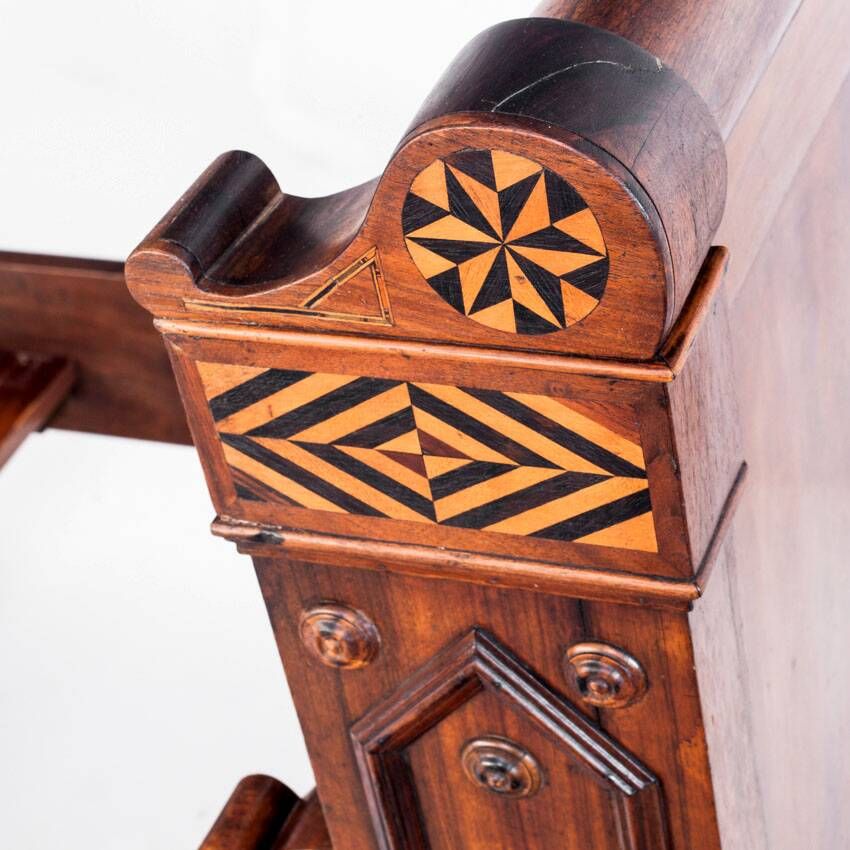 Bed made of solid walnut with marquetry details. France, 1930s.