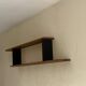 Stained wooden shelf