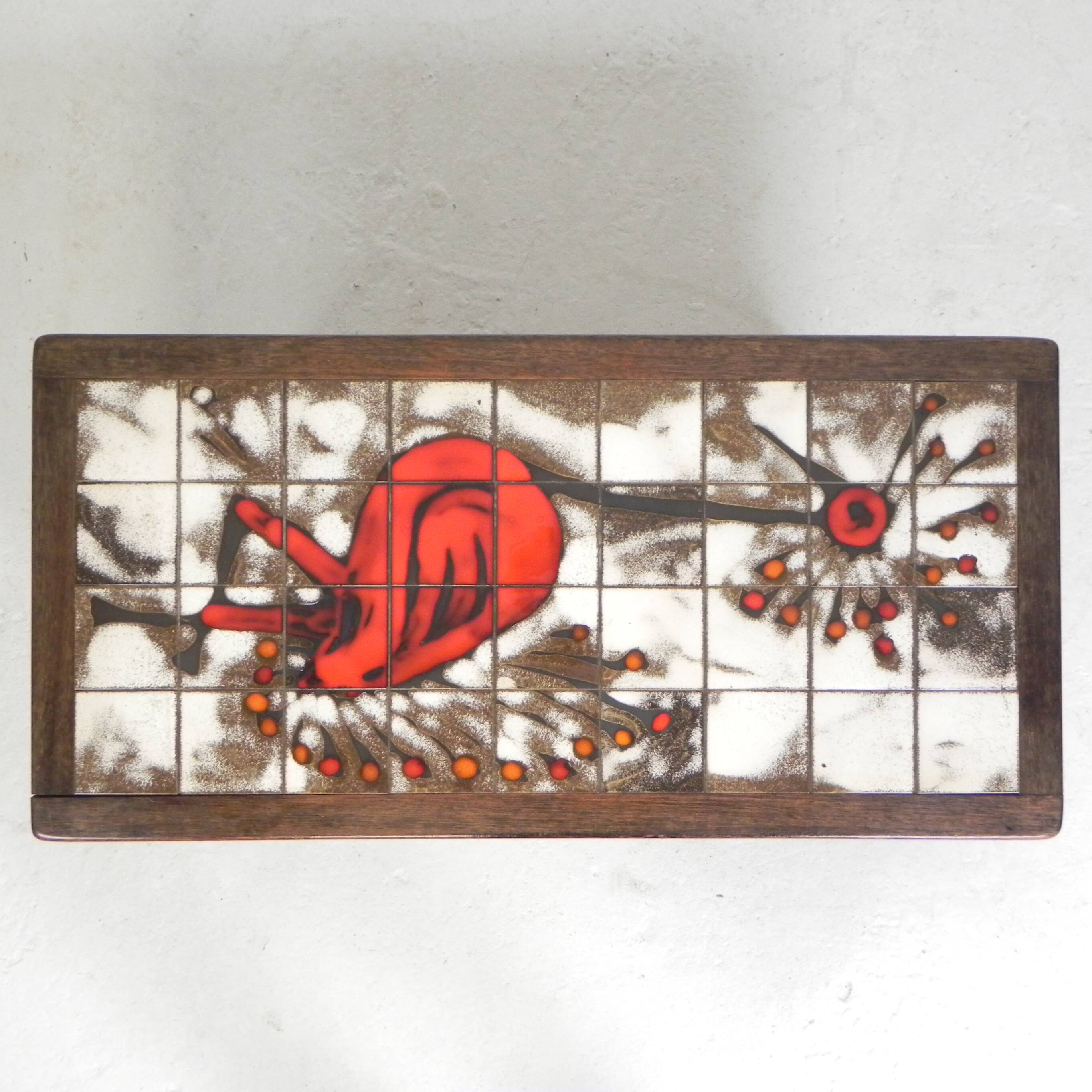 Square tile table from Vallauris, signed Dan with an image of a fantastic bird, 1960s.