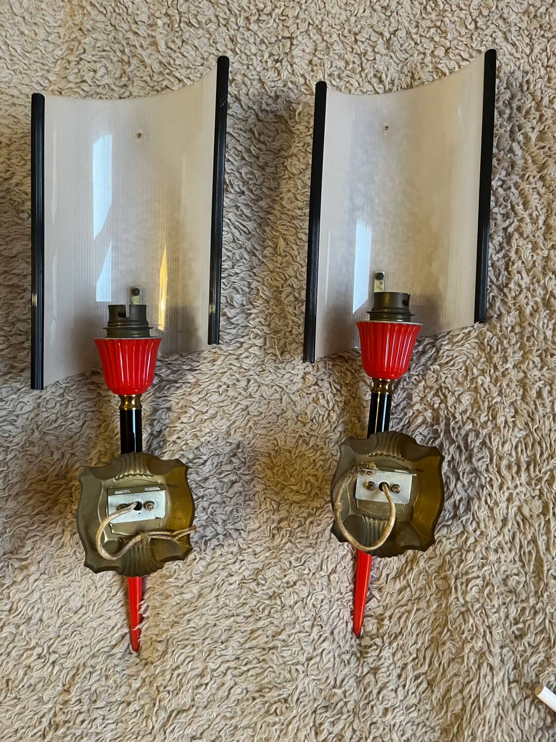 Pair of circa 70s plastic and brass wall lights