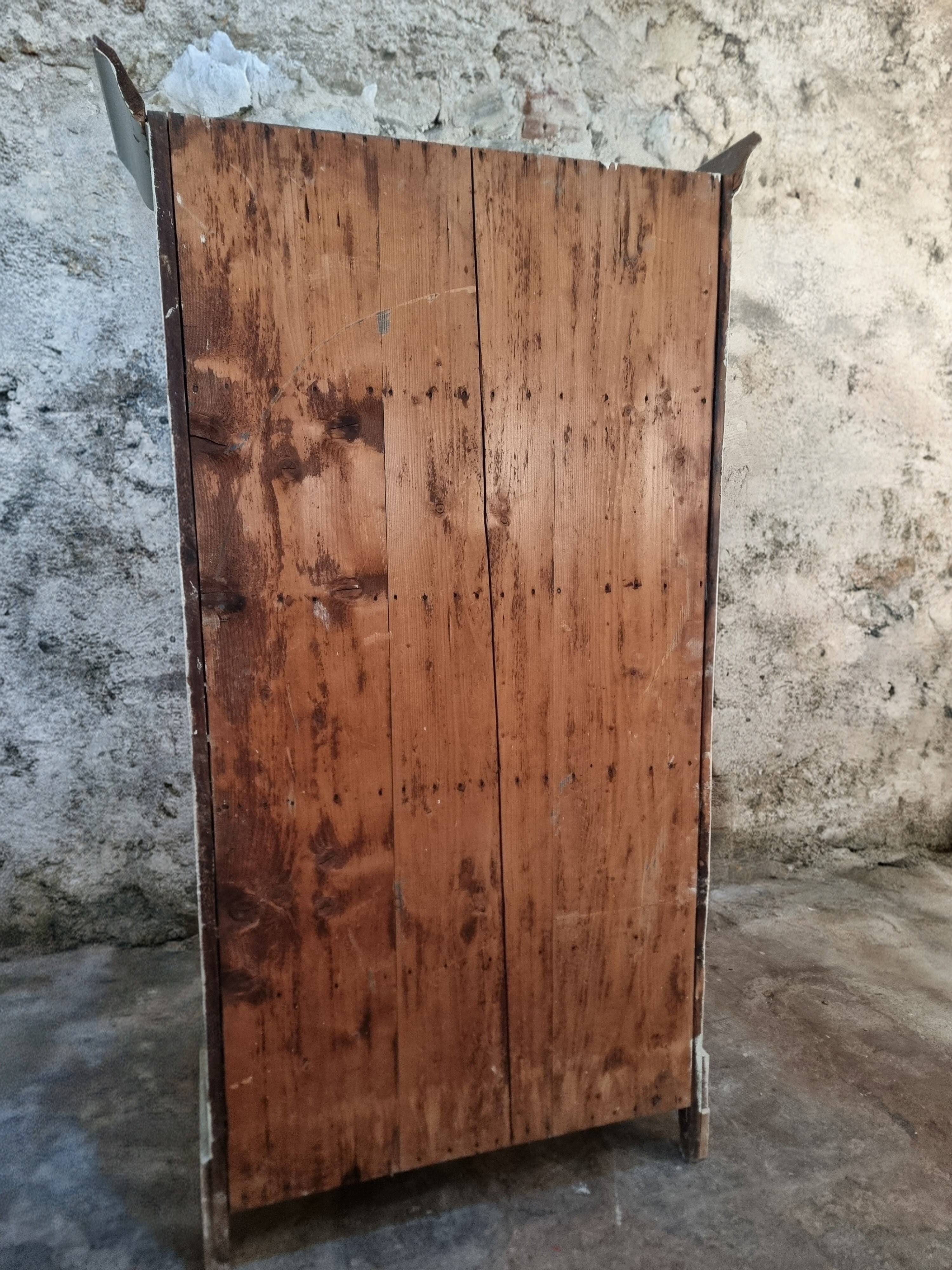 Antique French pine wardrobe with original white paint, circa 1900–1920.