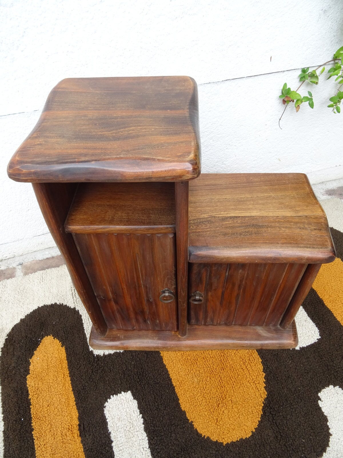 Asymmetrical brutalist furniture in solid elm