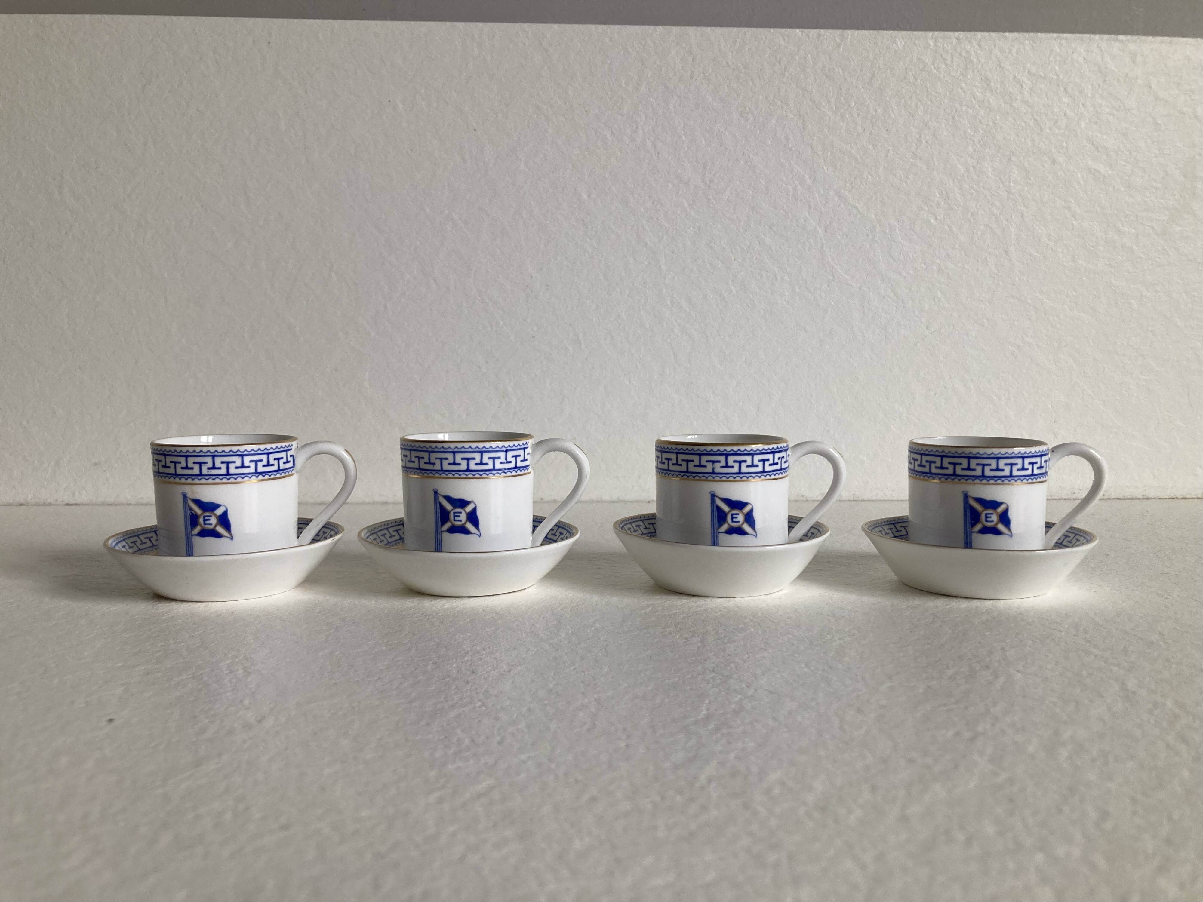 4 coffee cups and saucers