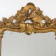 Antique flowered mirror from the 19th century.