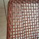 Modernist armchair in woven leather and black metal – 1960s–1970s