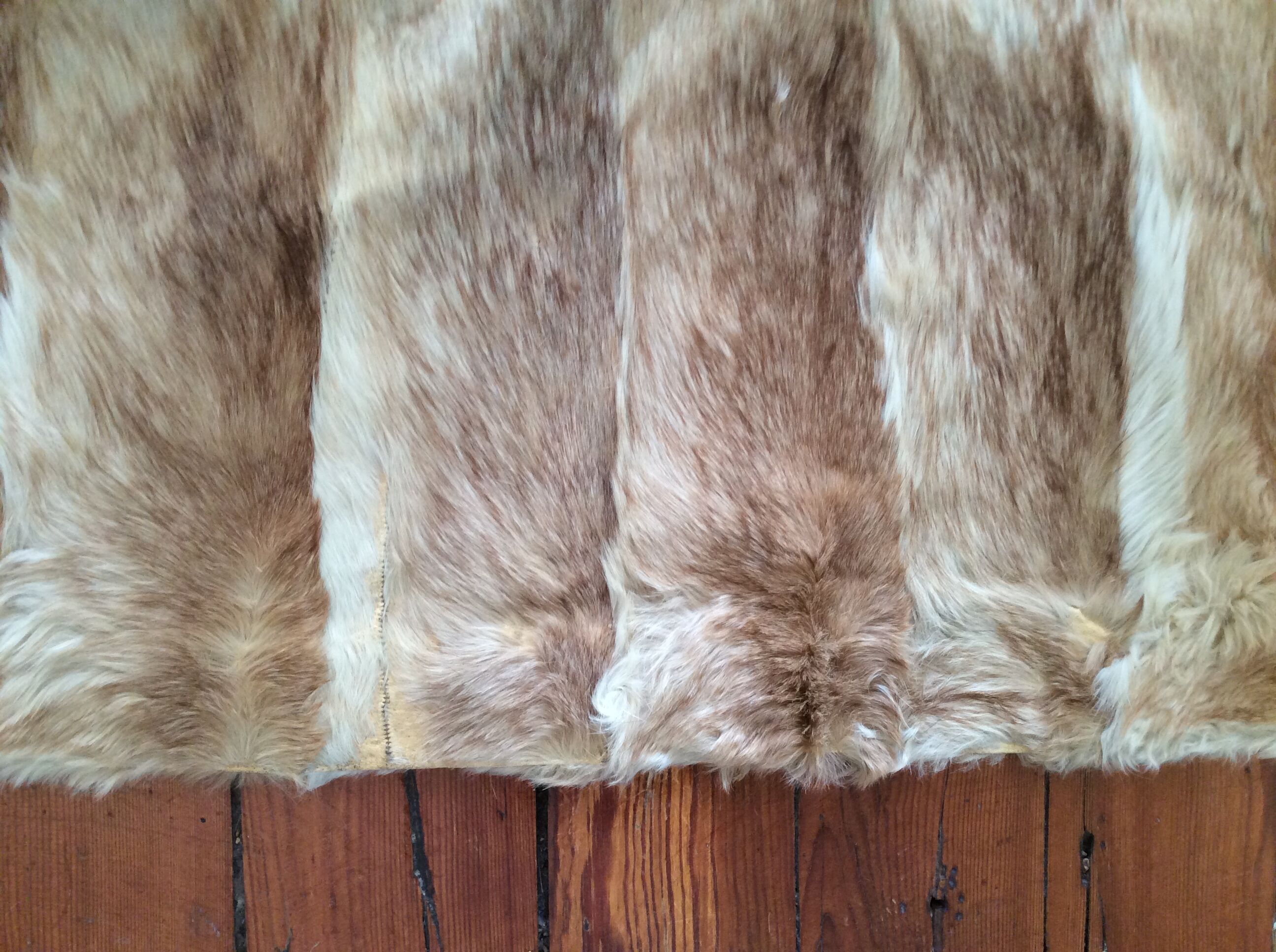 Rabbit skin rug, 200x225cm.