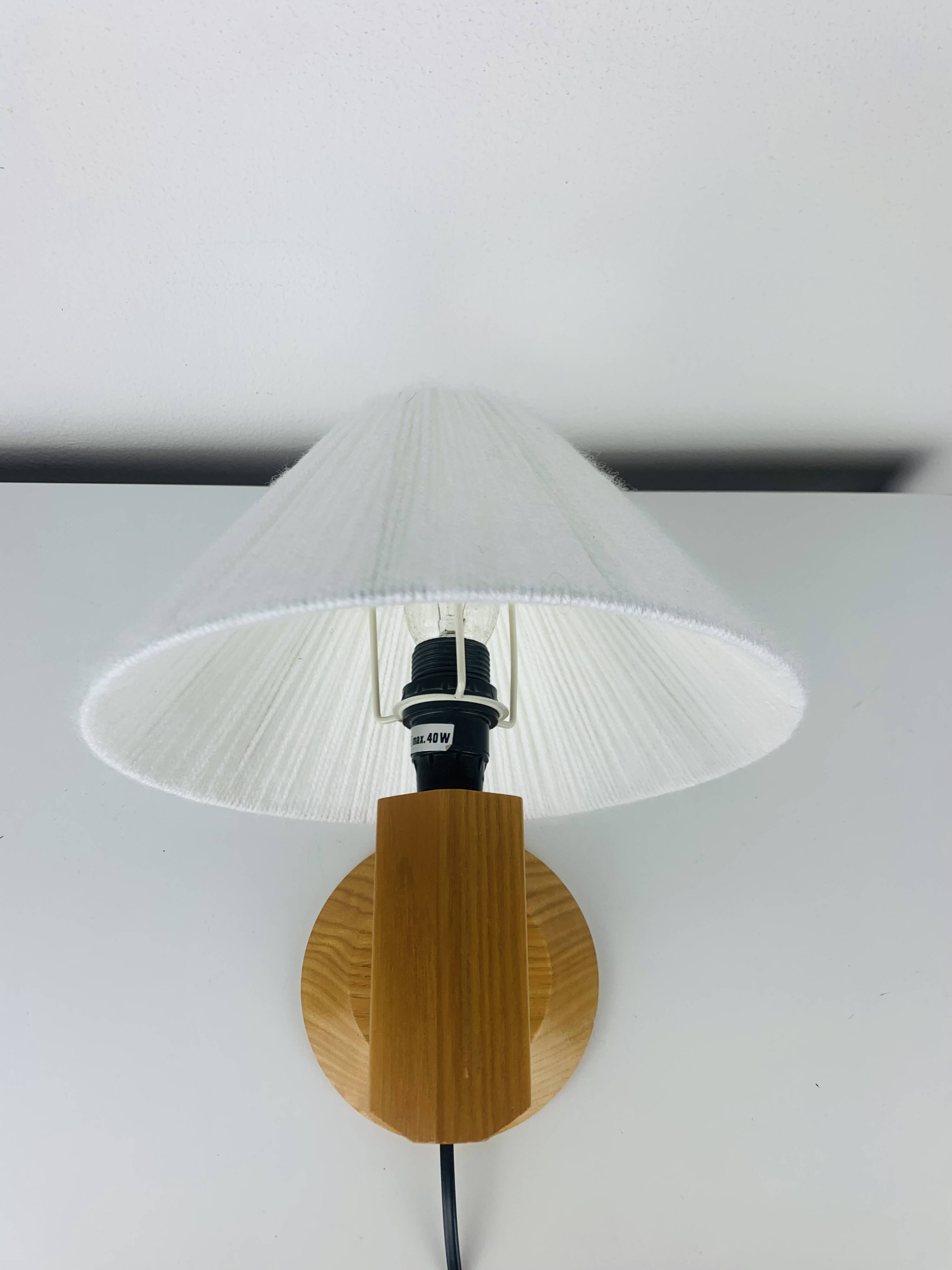 Vintage pine wall lamp and wool lampshade, 1960s