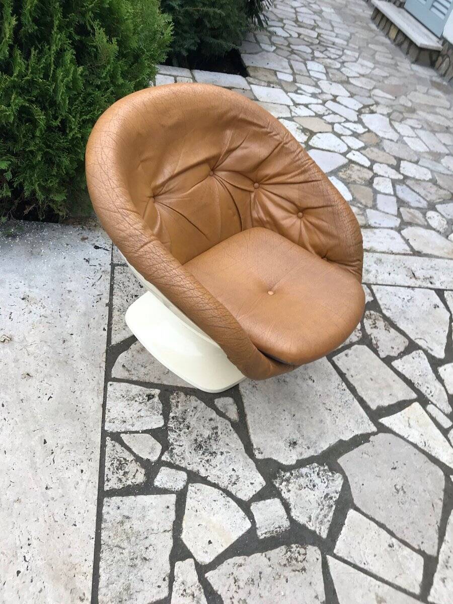 Brown tulip club chair in fibreglass resin and faux leather, France 1970s by Raphaël