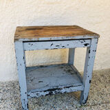 Patinated wood side table