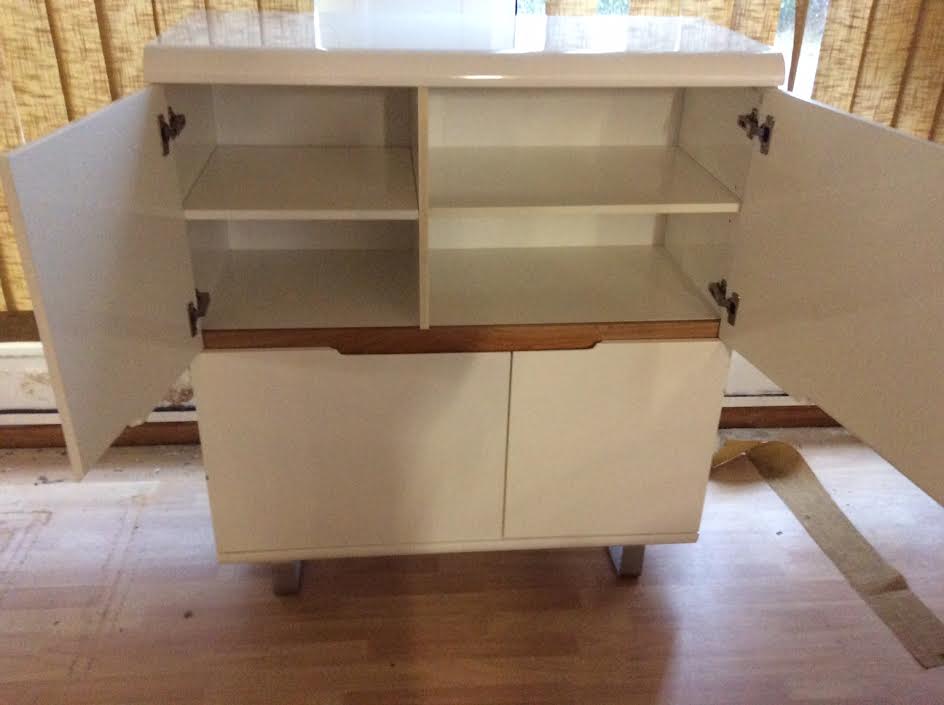 High furniture in white lacquered wood