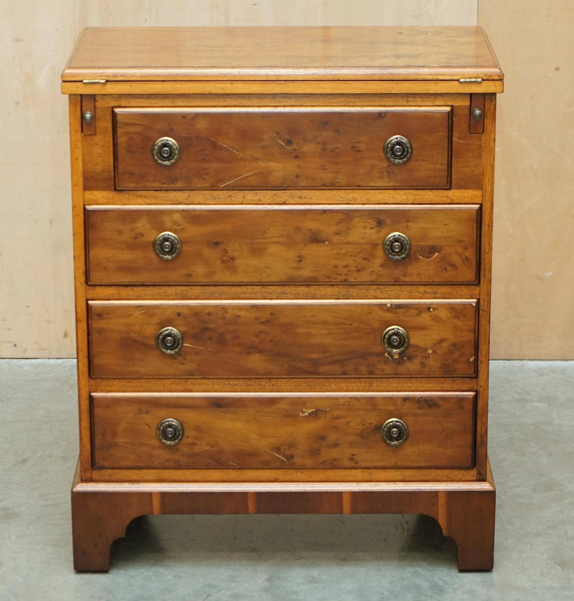 Vintage walnut commode with sliding top in Butler style.