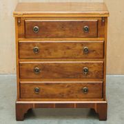 Vintage walnut commode with sliding top in Butler style.