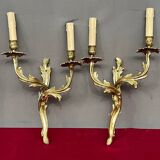 Paire d'appliques en bronze massif doré.