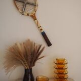 Tennis racket with maxima rachette tensioner