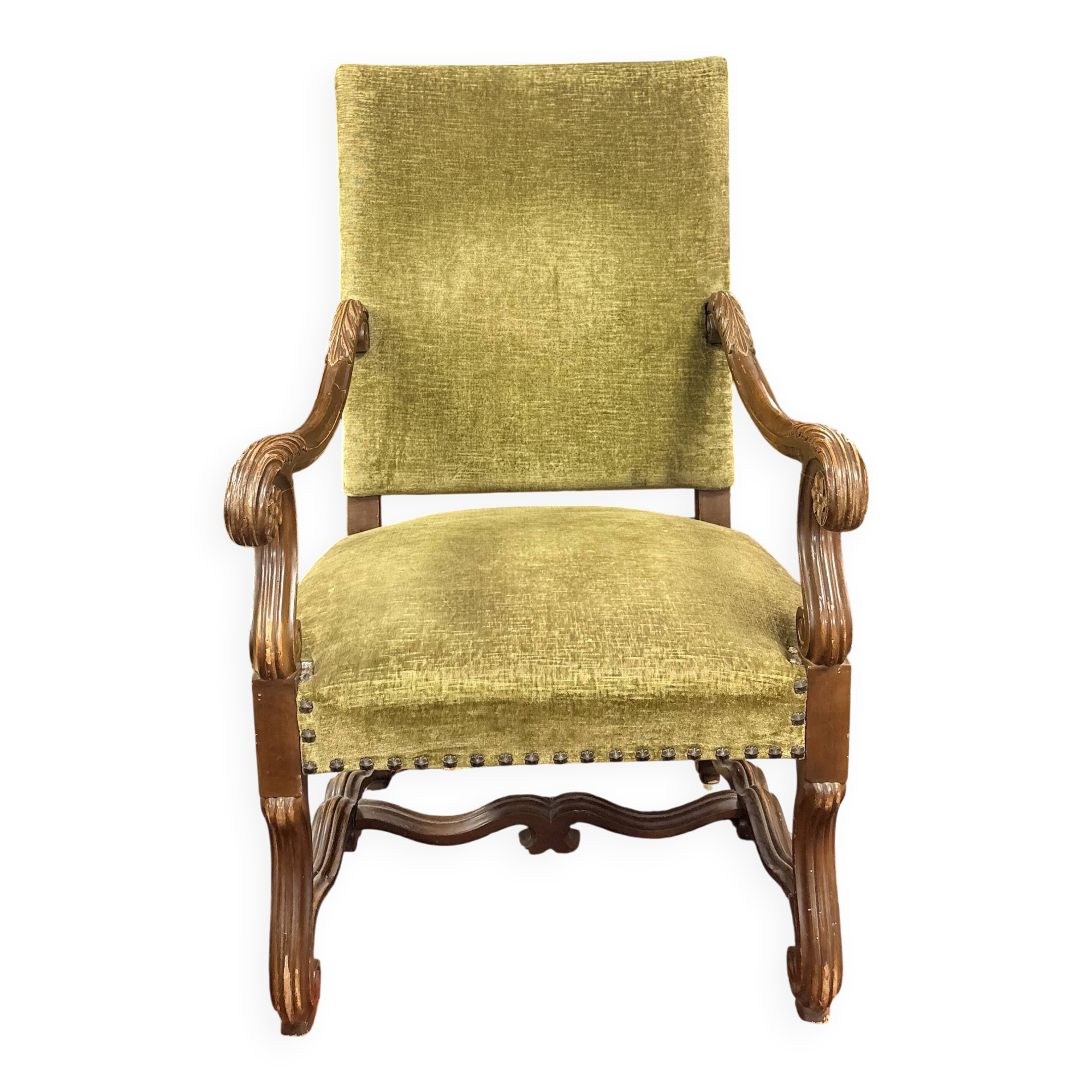 Magnificent armchair in carved solid walnut, in the Henri II style.