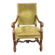 Magnificent armchair in carved solid walnut, in the Henri II style.